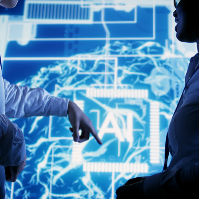 Dois executivos planejando a implementação de Agentes de IA em frente a uma tela com uma rede neural e as letras AI em destaque