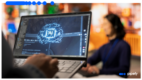 Pessoa usando notebook com imagem de IA na tela, simbolizando aplicação de agentes de IA para automação de processos