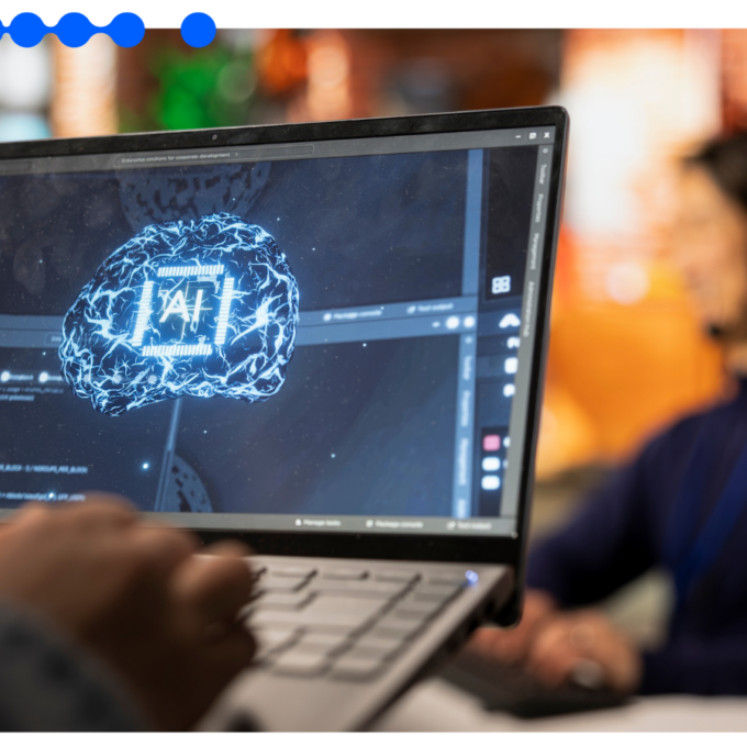 Pessoa usando notebook com imagem de IA na tela, simbolizando aplicação de agentes de IA para automação de processos