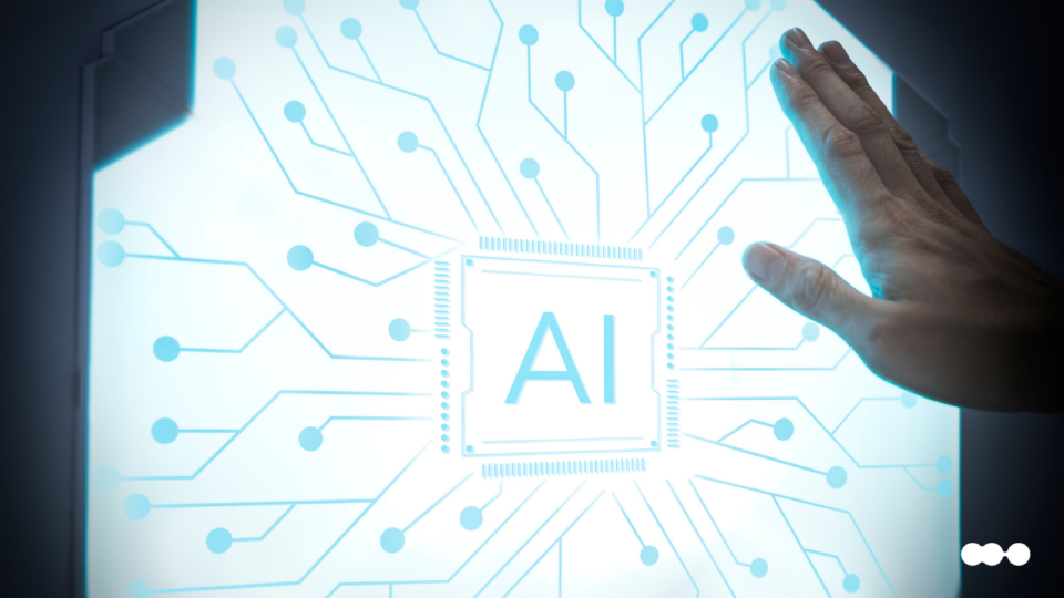 Mão interagindo com uma tela que exibe um chip de Inteligência Artificial, ilustrando as tendências de IA para automação