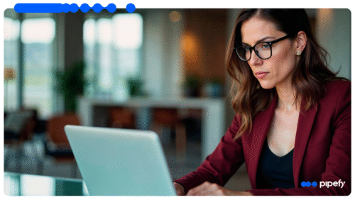 Executive reviewing business process automation (BPA) workflows powered by AI on a laptop in a corporate environment