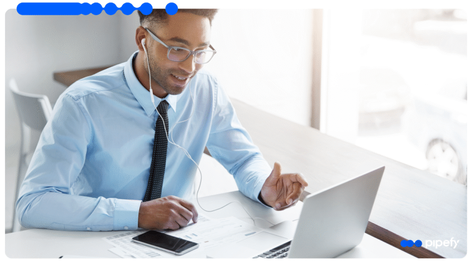 Professional on video call using laptop to discuss iPaaS solutions and workflow automation