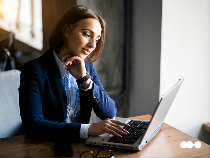 Professional reviewing workflow automation with RPA on a laptop