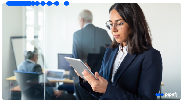 A modern financial office environment where a professional uses a digital dashboard to manage banking process automation workflows securely.