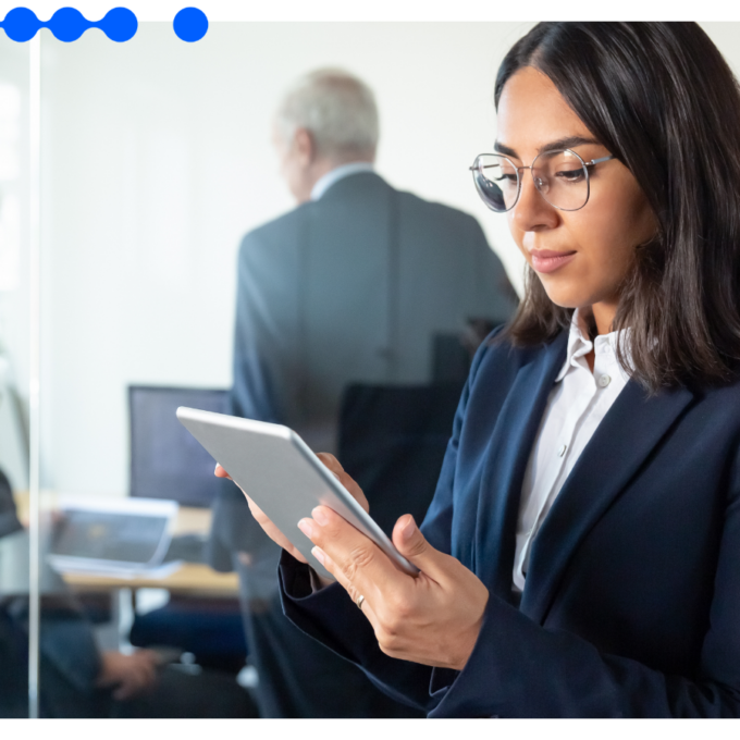 A modern financial office environment where a professional uses a digital dashboard to manage banking process automation workflows securely.
