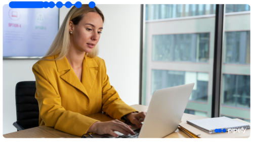 A procurement professional works through requests on a laptop, the steady flow RFQ software enables once approvals stop waiting in an inbox